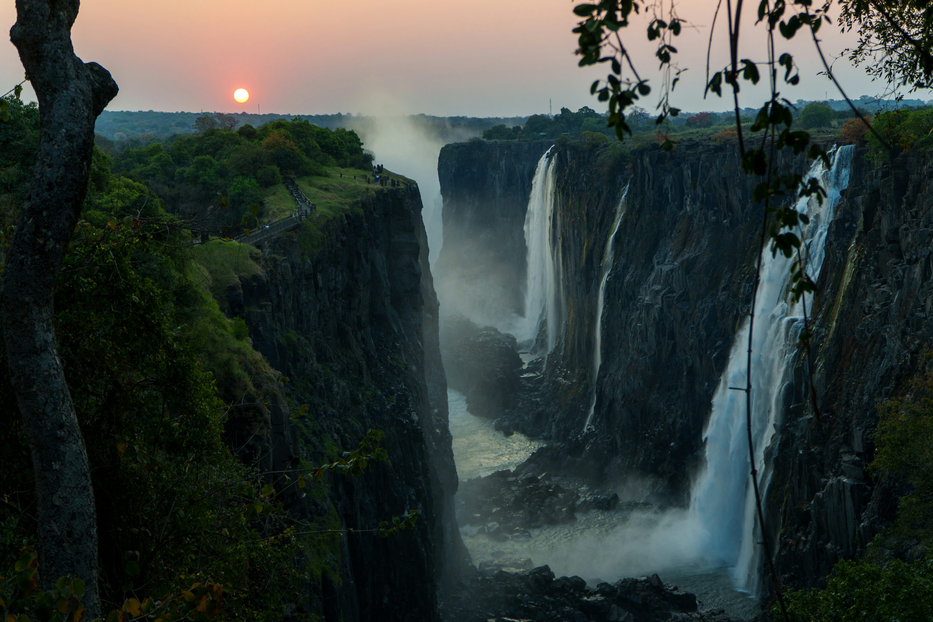 Victoria Falls on the Zambezi River at sunrise